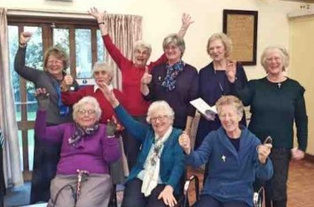 Newly enrolled members cheering